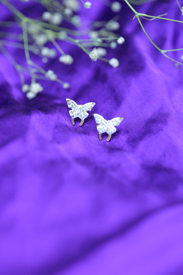 White butterfly studs