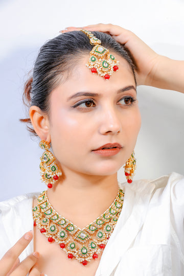 Heeraya – Emerald Kundan Bridal Set with Red Bead Drops