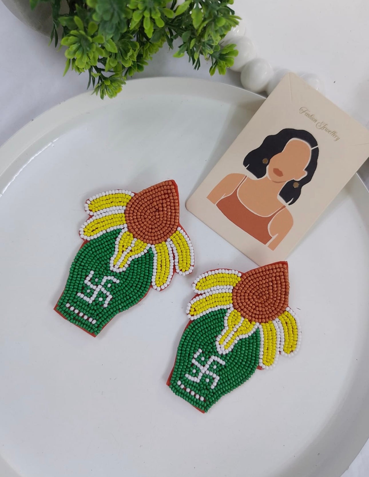 Green beaded kalash earrings