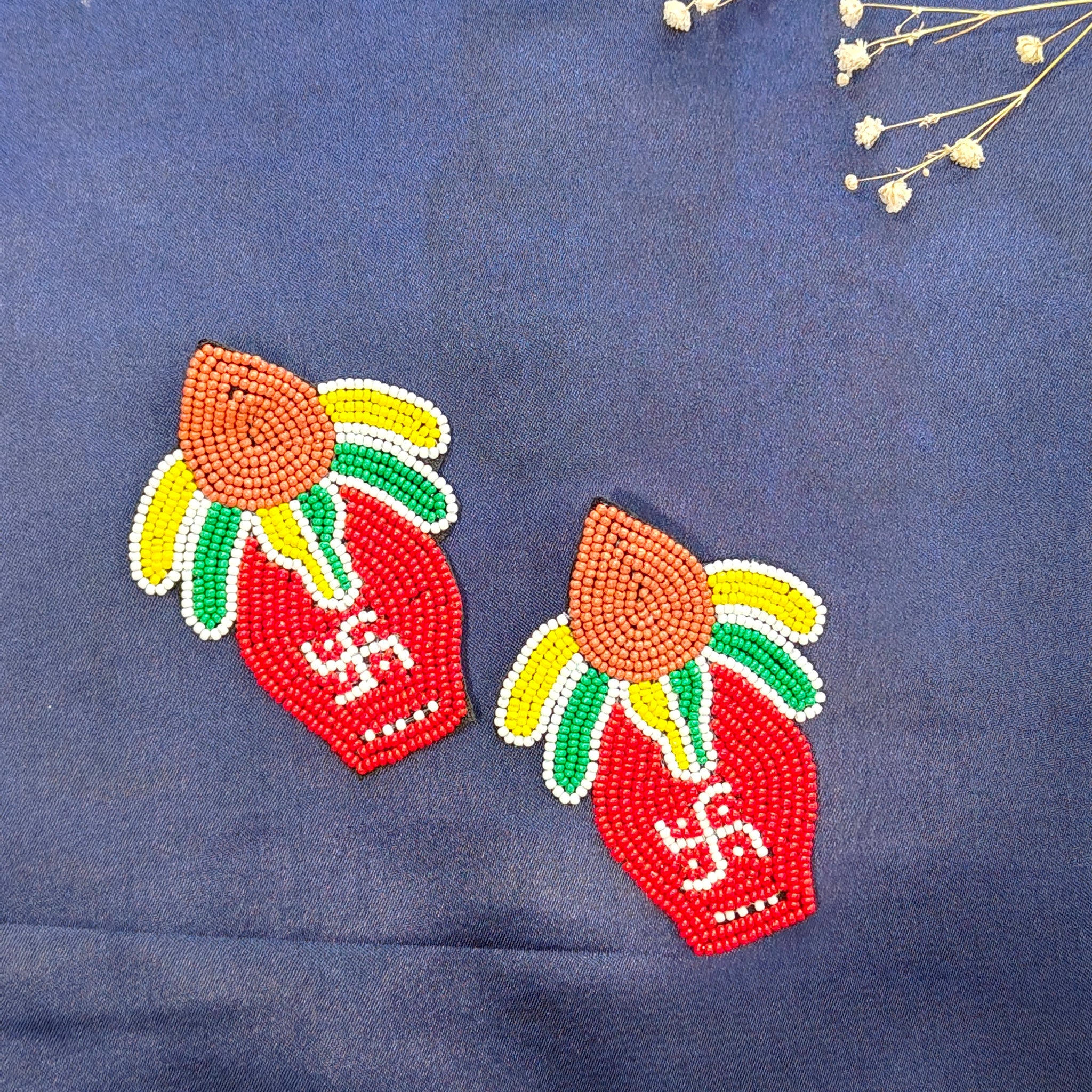 Red beaded kalash earrings