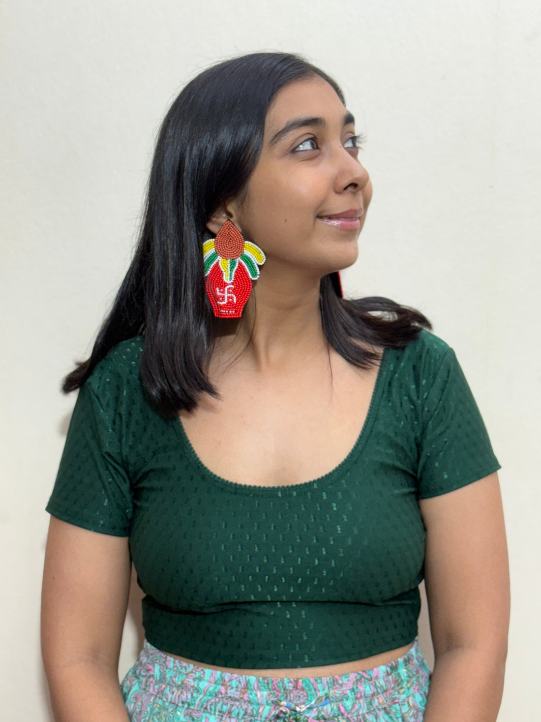Red beaded kalash earrings